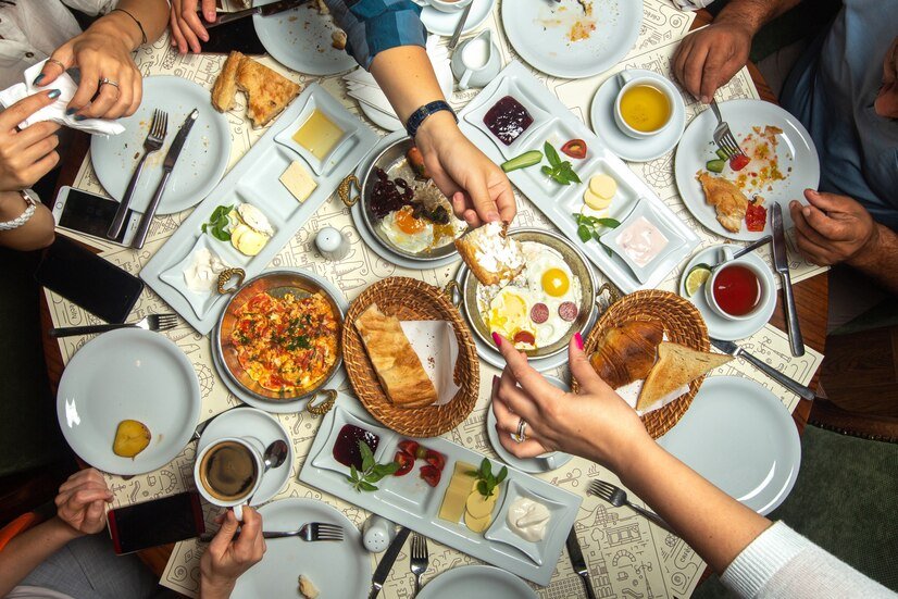 top-close-up-view-table-breakfast-time-family-having-with-different-meals