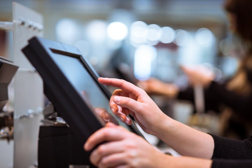 young-woman-hand-doing-process-payment-touchscreen-cash-register-finance-concept